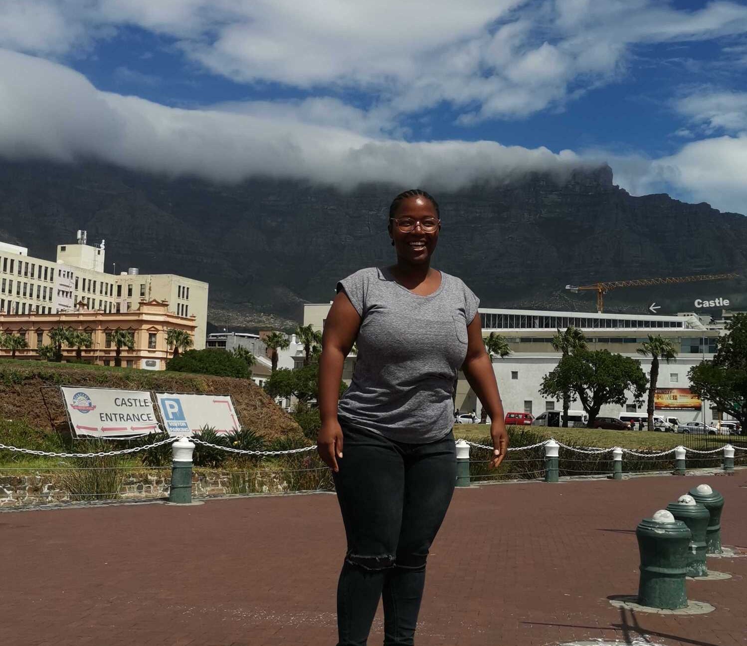 A photo of myself with Table Mountain in the background